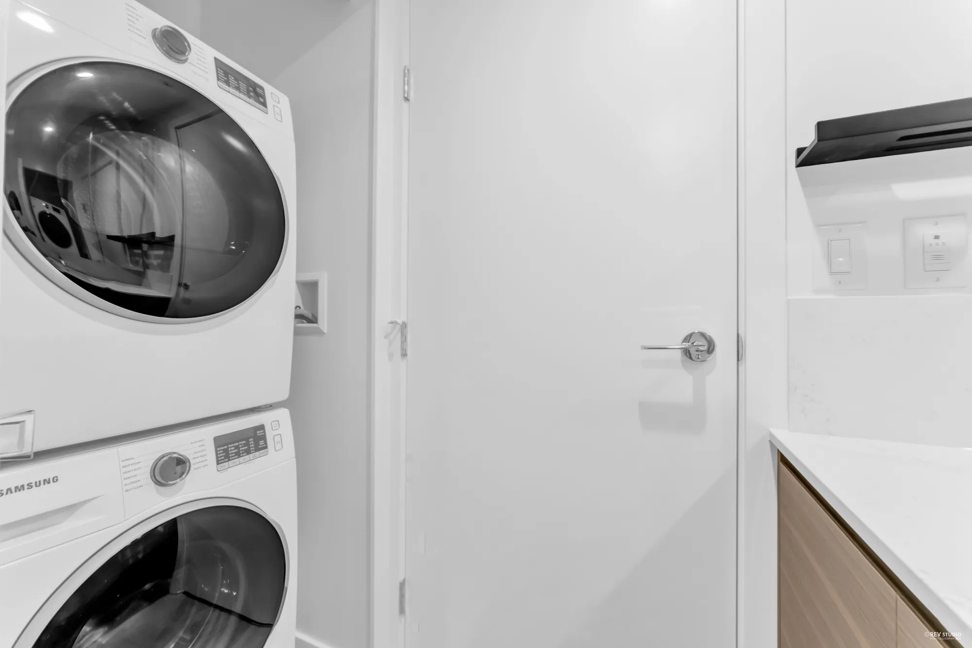 Stacked washer and dryer in their closet