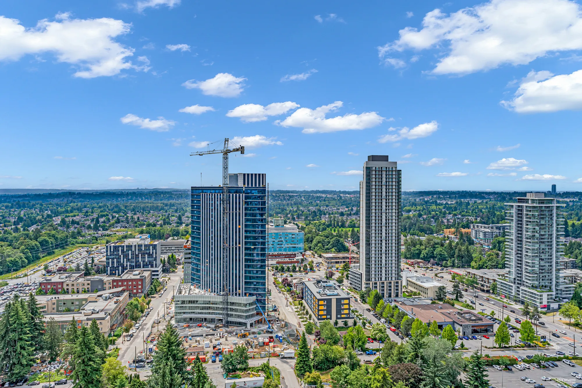 New towers and cranes to the south, low streets beyond